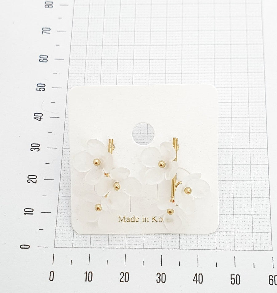 simple white gold flower earrings accessory