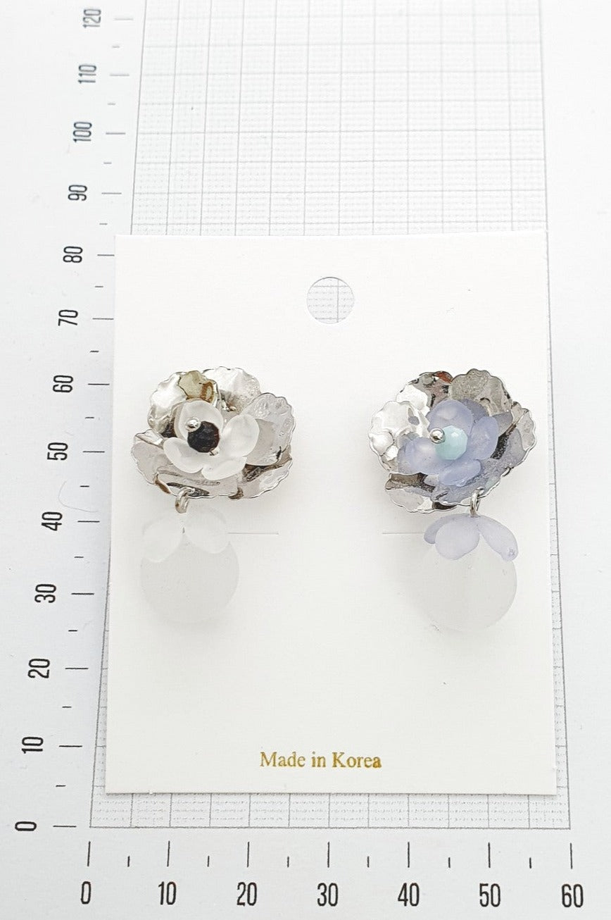 professional white and blue flower earrings floral