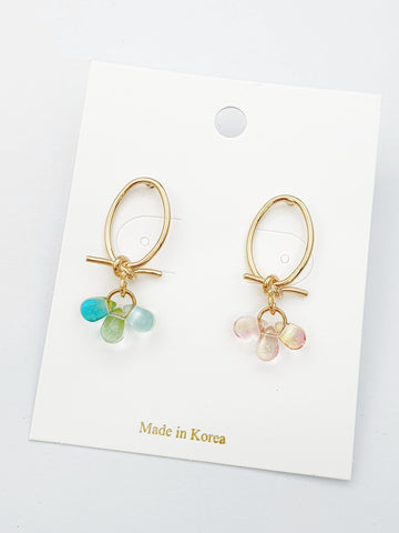 kayon gold knot blue and peach dangle earrings